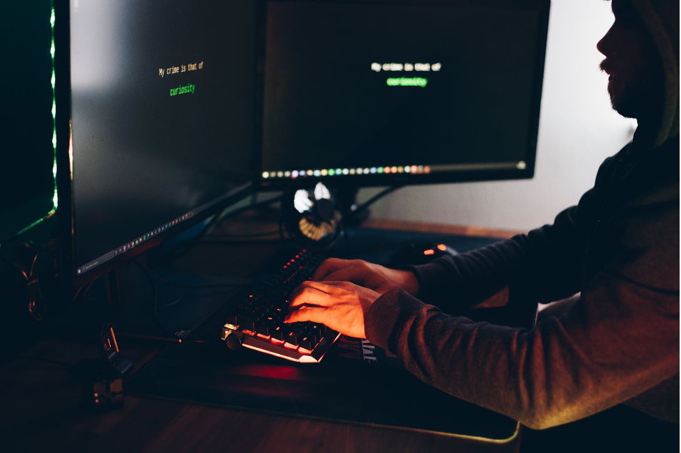 A person working on his computer. 